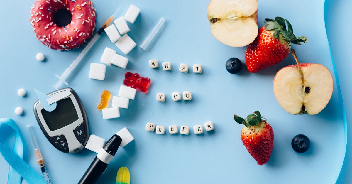 Athlete's training table with carbohydrate-rich foods, glucose meter, and insulin pump equipment laid out